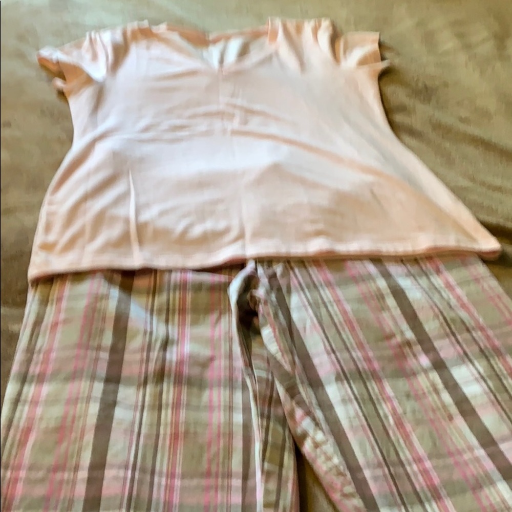 Plaid shorts and pink shirt